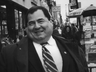 Jerry Nadler is wearing a suit, tie and a jacket in this monochrome picture.